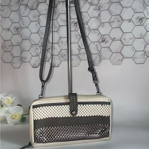 The Sak Gray and Cream Crossbody Bag with Modern Design